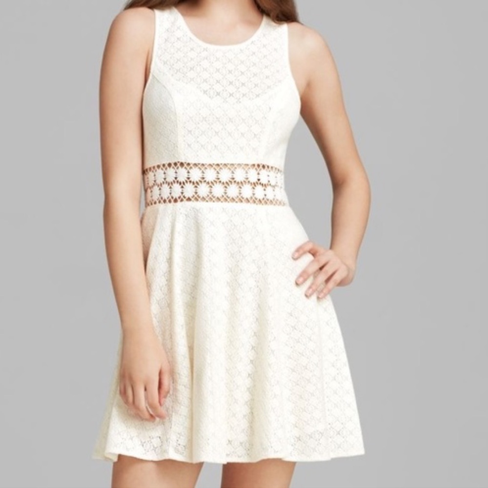 FREE PEOPLE Ivory Lace Mini with daisy cutouts Dress